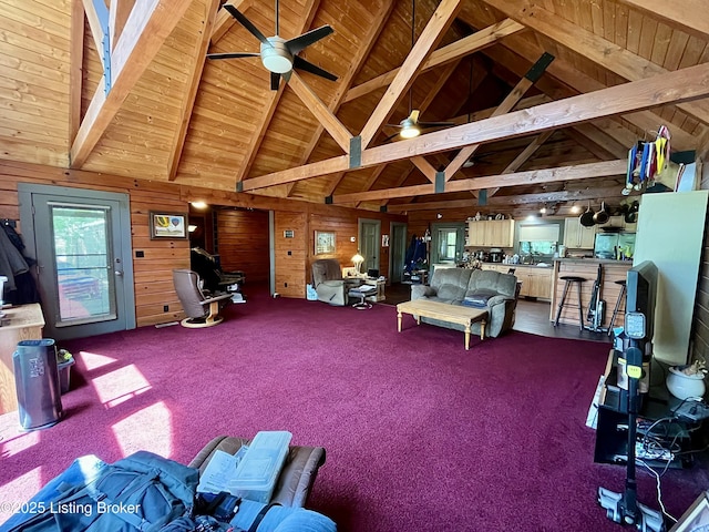 2212 Duff Rd, Leitchfield, KY 42754 - carpeted living area featuring wooden walls, wooden ceiling with exposed beams, high vaulted ceiling, and a ceiling fan