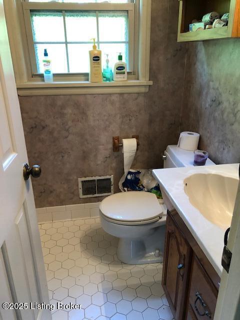 8907 Lakeridge Dr, Louisville, KY 40272 - bathroom with tile patterned floors, toilet, and vanity