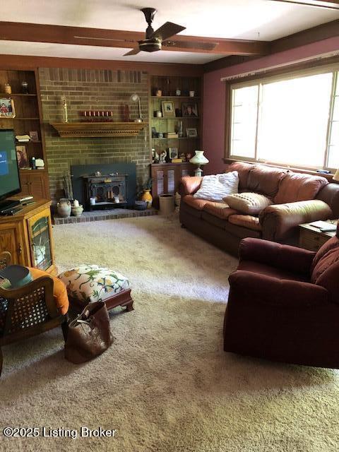 8907 Lakeridge Dr, Louisville, KY 40272 - living area with carpet flooring and a ceiling fan