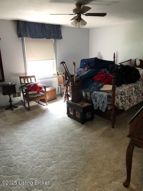 8907 Lakeridge Dr, Louisville, KY 40272 - carpeted bedroom with a ceiling fan