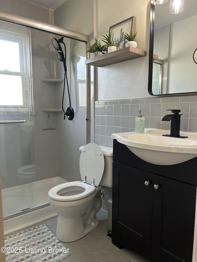 4908 Fielding Way, Louisville, KY 40216 - full bathroom with toilet, a shower stall, tile patterned floors, vanity, and tasteful backsplash