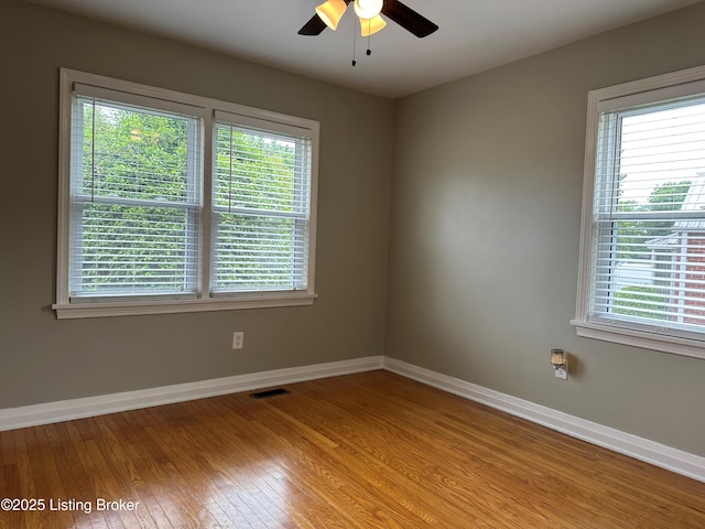 4908 Fielding Way, Louisville, KY 40216 - spare room featuring plenty of natural light, light wood-style flooring, baseboards, and a ceiling fan