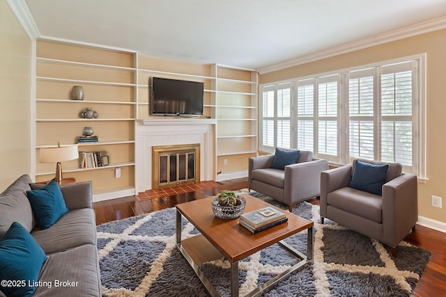 2804 Mayford Way, Louisville, KY 40220 - living room featuring ornamental molding, wood finished floors, built in features, and a glass covered fireplace