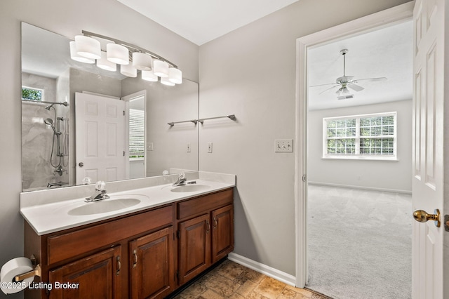 10707 Hickory Cove Ct, Louisville, KY 40245 - bathroom featuring ceiling fan, double vanity, baseboards, and a shower