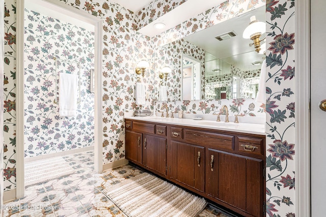 1309 S Buckeye Ln, Goshen, KY 40026 - bathroom featuring wallpapered walls, double vanity, and baseboards