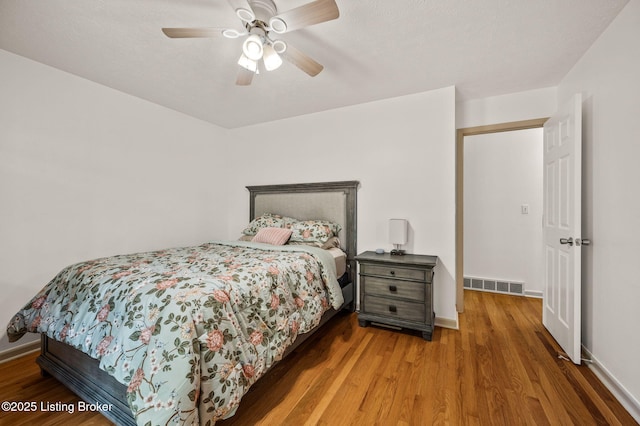 8200 Casualwood Way, Louisville, KY 40291 - bedroom featuring wood finished floors, baseboards, and a ceiling fan