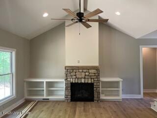 7001 Stable Ct, Crestwood, KY 40014 - unfurnished living room with lofted ceiling, baseboards, ceiling fan, wood finished floors, and a fireplace