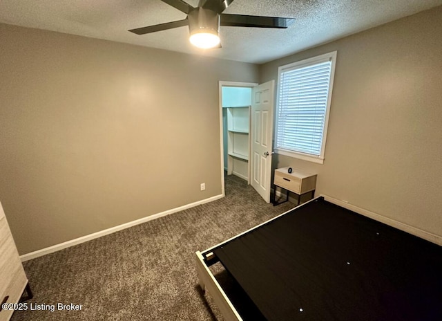 2512 S 4th St, Louisville, KY 40208 - unfurnished bedroom featuring carpet floors, a textured ceiling, baseboards, and a ceiling fan