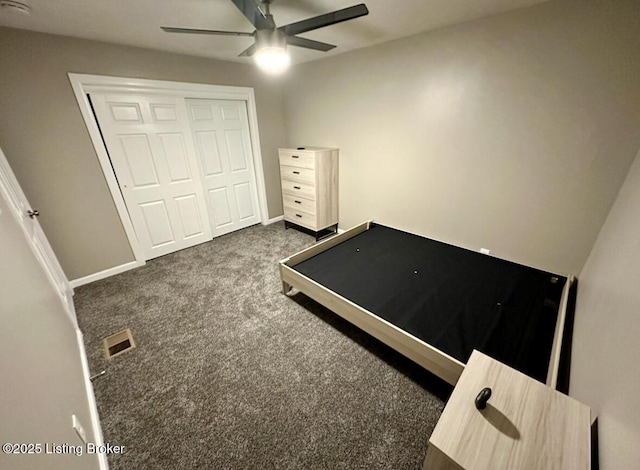 2512 S 4th St, Louisville, KY 40208 - unfurnished bedroom with dark carpet, a closet, a ceiling fan, and baseboards