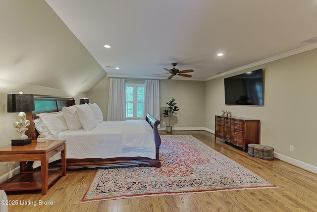 bedroom with baseboards, wood finished floors, recessed lighting, crown molding, and ceiling fan