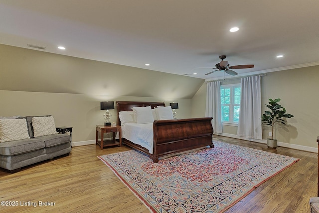 bedroom featuring recessed lighting, baseboards, light wood-style floors, lofted ceiling, and ceiling fan