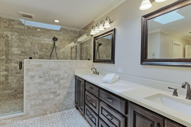 bathroom featuring ornamental molding, a stall shower, double vanity, and recessed lighting