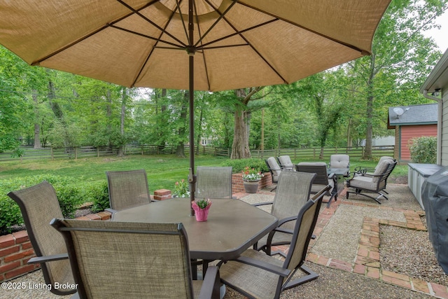 view of patio with outdoor dining area and an outdoor living space