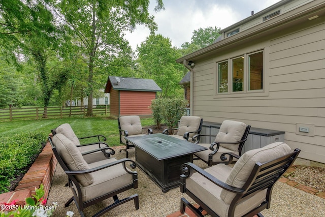 view of patio featuring an outbuilding