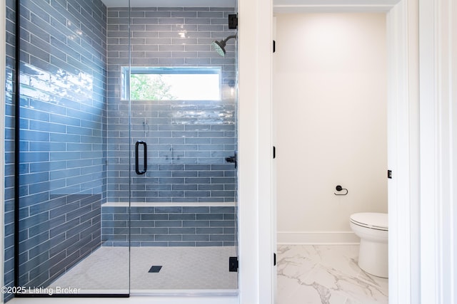 4227 Stilger Cir, Louisville, KY 40299 - full bathroom featuring a shower stall, marble look tiles, toilet, and baseboards