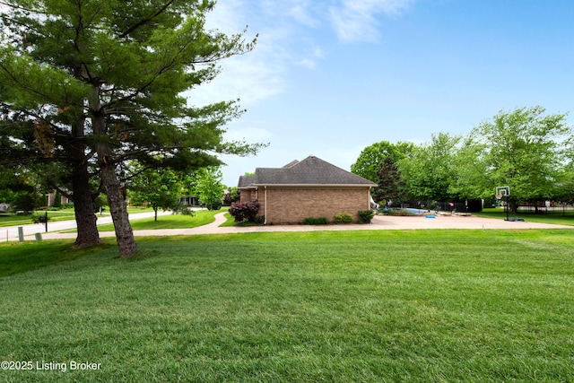 4227 Stilger Cir, Louisville, KY 40299 - view of home's exterior with a yard and brick siding