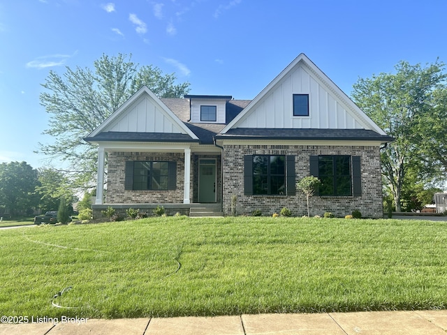 4227 Stilger Cir, Louisville, KY 40299 - view of front of house with board and batten siding, a front lawn, and brick siding