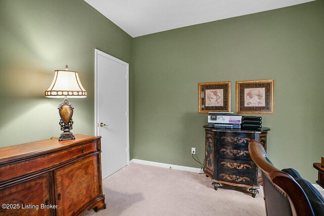 office with light colored carpet and baseboards