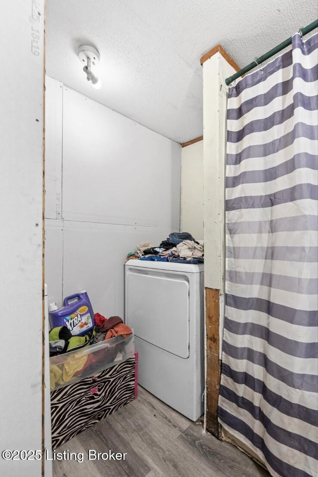 1115 Tilley Dr, Carrollton, KY 41008 - washroom with washer / clothes dryer, wood finished floors, and a textured ceiling