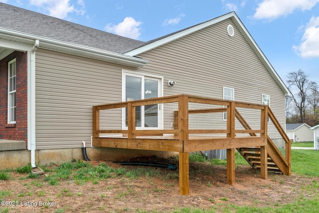 510 University Dr, Radcliff, KY 40160 - view of side of property featuring a deck, a shingled roof, brick siding, and stairs