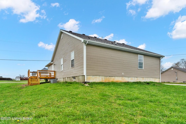 510 University Dr, Radcliff, KY 40160 - view of side of property with a deck, a lawn, and central air condition unit