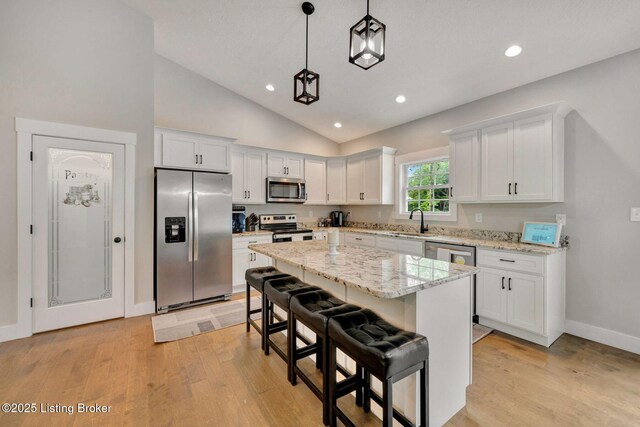 90 Glenn Eagle Rd, Brandenburg, KY 40108 - kitchen with stainless steel appliances, a sink, baseboards, white cabinetry, and recessed lighting