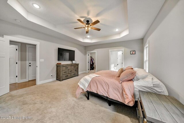 90 Glenn Eagle Rd, Brandenburg, KY 40108 - bedroom featuring light carpet, a raised ceiling, recessed lighting, baseboards, and a spacious closet
