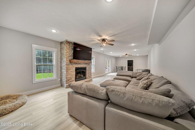 90 Glenn Eagle Rd, Brandenburg, KY 40108 - living area with ceiling fan, light wood finished floors, recessed lighting, a brick fireplace, and baseboards