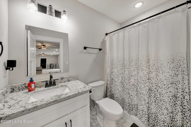 90 Glenn Eagle Rd, Brandenburg, KY 40108 - full bath featuring a ceiling fan, vanity, toilet, a shower with curtain, and marble look tiles