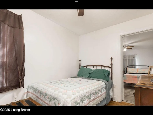 4328 S 1st St, Louisville, KY 40214 - bedroom with wood finished floors and ceiling fan