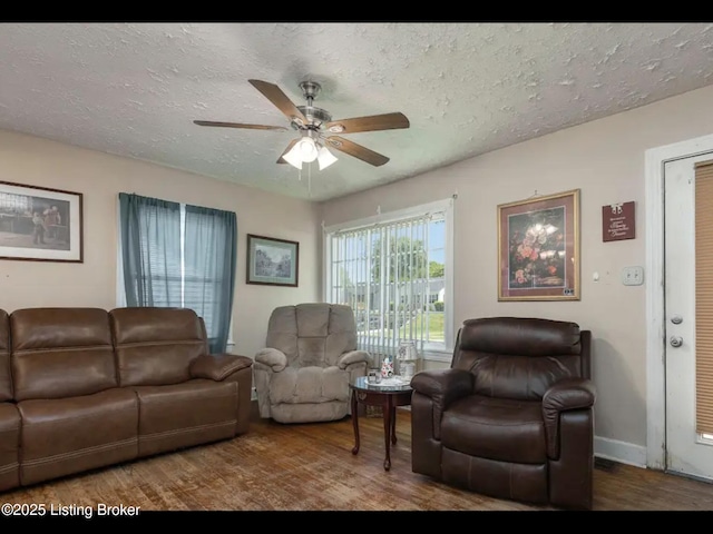 4328 S 1st St, Louisville, KY 40214 - living area featuring ceiling fan, a textured ceiling, wood finished floors, and baseboards