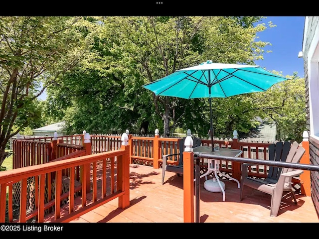 4328 S 1st St, Louisville, KY 40214 - wooden terrace with outdoor dining area