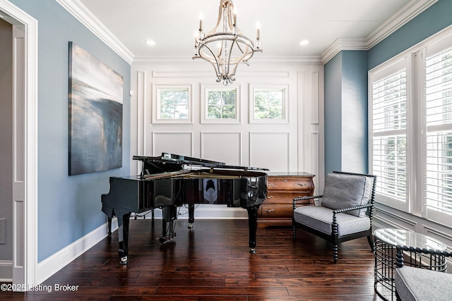 living area featuring a chandelier, dark wood finished floors, healthy amount of natural light, crown molding, and recessed lighting