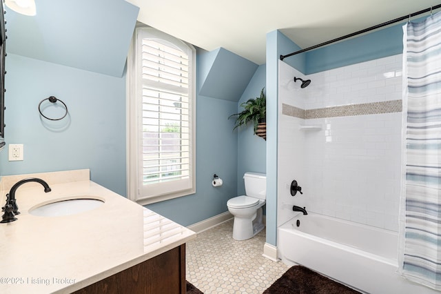 full bathroom featuring toilet, vanity, shower / bath combination with curtain, tile patterned floors, and baseboards
