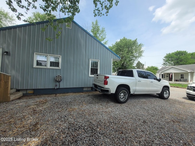 906 Kelly St, Carrollton, KY 41008 - view of side of home with board and batten siding