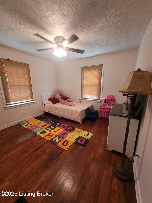 906 Kelly St, Carrollton, KY 41008 - bedroom featuring wood finished floors, a textured ceiling, and ceiling fan