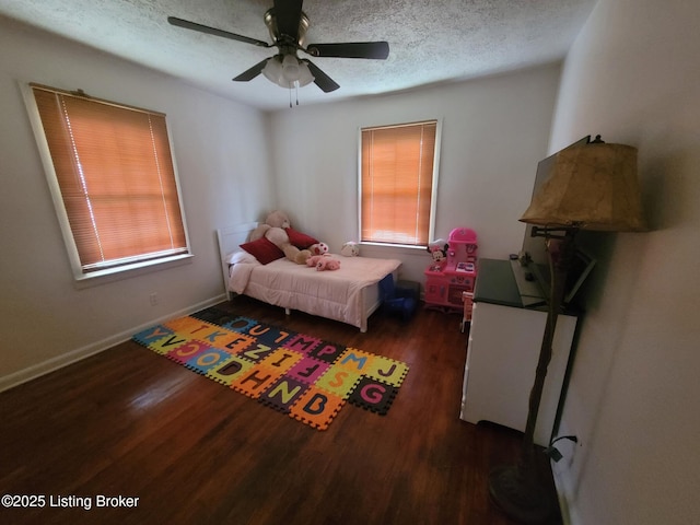 906 Kelly St, Carrollton, KY 41008 - bedroom featuring wood finished floors, a textured ceiling, a ceiling fan, and baseboards