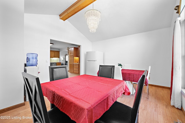 7601 Greenfield Ave, Louisville, KY 40214 - dining space with a chandelier, light wood-type flooring, and baseboards