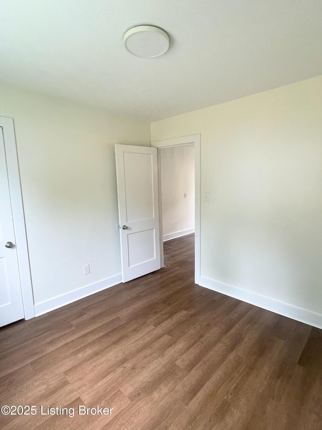 3004 Wayne Rd, Louisville, KY 40216 - spare room featuring baseboards and wood finished floors