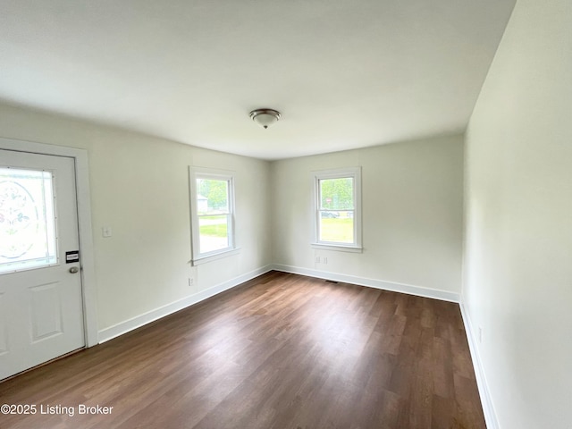 3004 Wayne Rd, Louisville, KY 40216 - foyer with dark wood-type flooring and baseboards