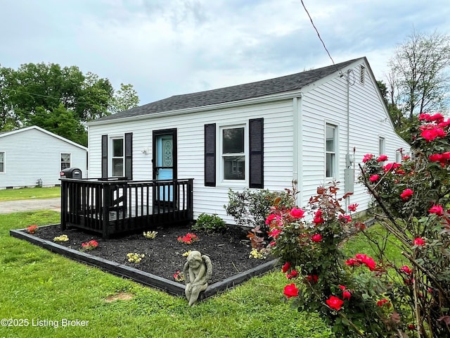 3004 Wayne Rd, Louisville, KY 40216 - rear view of property with a deck, a lawn, and a shingled roof