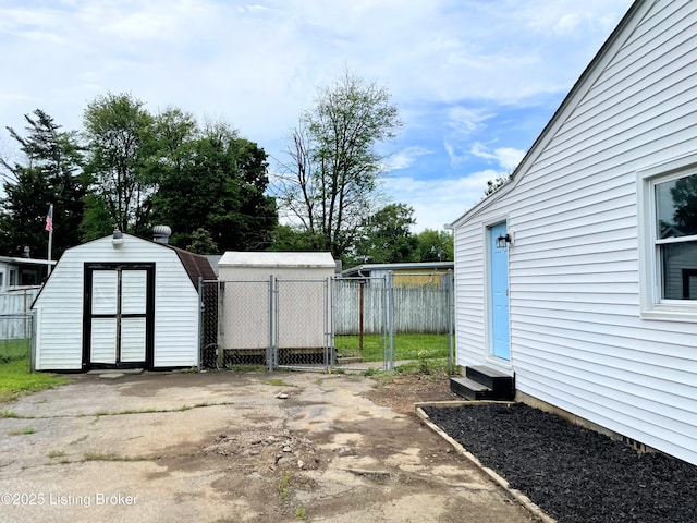 3004 Wayne Rd, Louisville, KY 40216 - view of yard featuring entry steps, fence, a storage shed, and an outbuilding