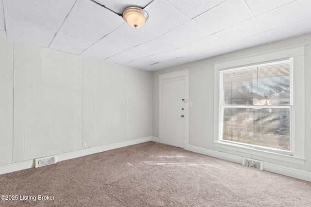 207 Ottawa Ave, Louisville, KY 40214 - carpeted spare room featuring a paneled ceiling