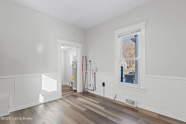 207 Ottawa Ave, Louisville, KY 40214 - empty room featuring wainscoting and wood finished floors