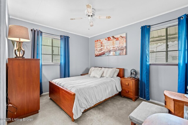 200 Derby Ave, Louisville, KY 40218 - bedroom with light colored carpet, crown molding, baseboards, and ceiling fan