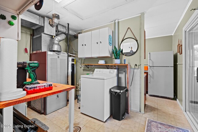 200 Derby Ave, Louisville, KY 40218 - laundry room with washer / dryer, light tile patterned flooring, and cabinet space