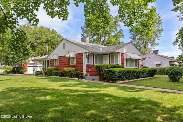 200 Derby Ave, Louisville, KY 40218 - bungalow-style home with a front yard, a chimney, and an attached garage