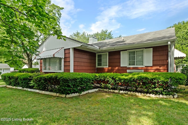 200 Derby Ave, Louisville, KY 40218 - view of front facade featuring a front lawn and a chimney