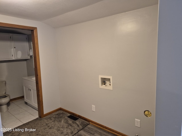 810 Packard Ave, Louisville, KY 40217 - laundry area with baseboards
