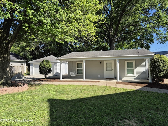 810 Packard Ave, Louisville, KY 40217 - ranch-style house featuring a front lawn, a porch, an outbuilding, a garage, and roof with shingles